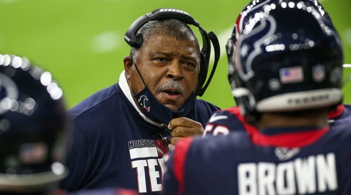 Romeo Crennel coaching on the sideline during a Texans game.