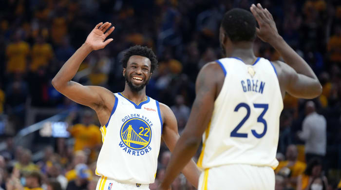Andrew Wiggins and Draymond Green celebrate during Game 5