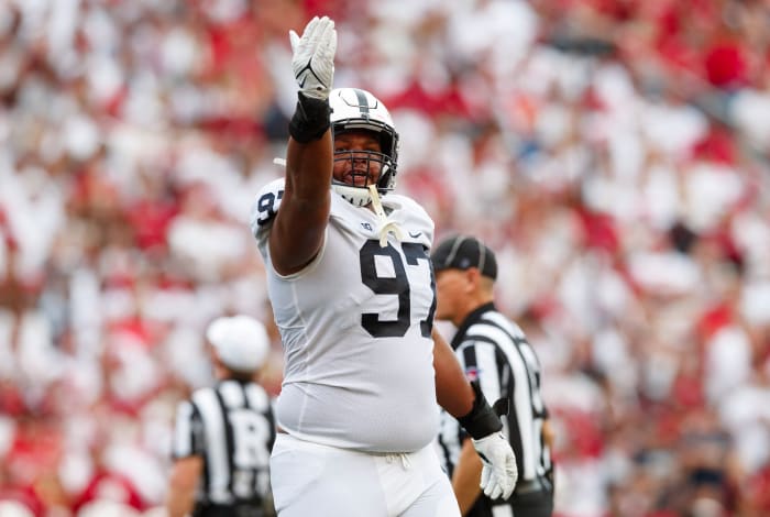 Sep 4, 2021; Madison, Wisconsin, USA; Penn State Nittany Lions defensive tackle PJ Mustipher (97) celebrates following a turnover during the second quarter against the Wisconsin Badgers at Camp Randall Stadium. Mandatory Credit: Jeff Hanisch-USA TODAY Sports