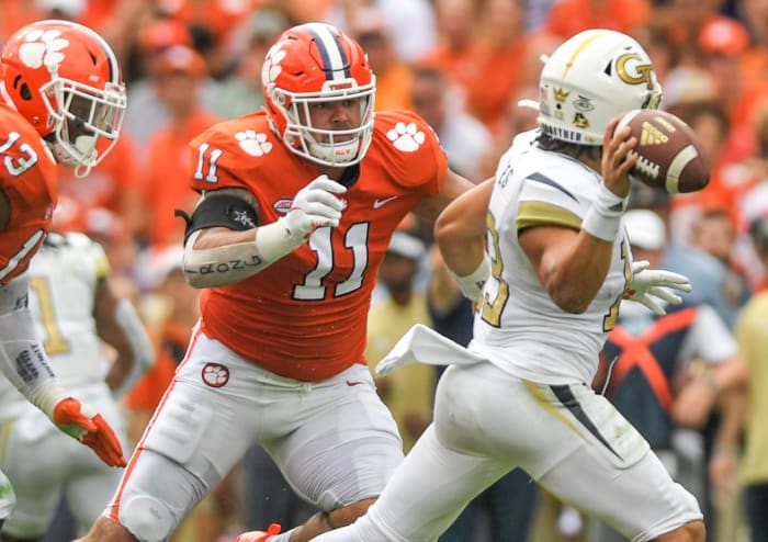 Clemson's Bryan Bresee attempts to make a tackle against Georgia Tech