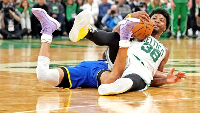Boston Celtics protect Marcus Smart (36) and Golden State Warriors protect Stephen Curry