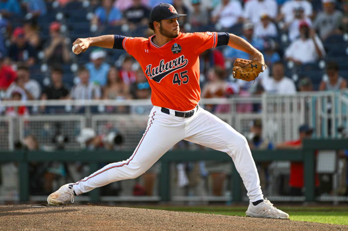 Jun 18, 2022; Omaha, NE, USA; Auburn Tigers starting pitcher Joseph Gonzalez (45) throws against the Ole Miss Rebels in the first inning at Charles Schwab Field. Mandatory Credit: Steven Branscombe-USA TODAY Sports