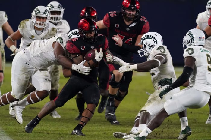 San Diego State Aztecs running back Kaegun Williams (26) carries the ball in the third quarter against the Colorado State Rams at Dignity Health Sports Park.  SDSU defeated CSU 29-17