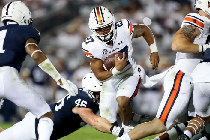 Sep 18, 2021; University Park, Pennsylvania, USA; Auburn Tigers running back Jarquez Hunter (27) runs with the ball during the third quarter against the Penn State Nittany Lions at Beaver Stadium. Penn State defeated Auburn 28-20. Mandatory Credit: Matthew O'Haren-USA TODAY Sports