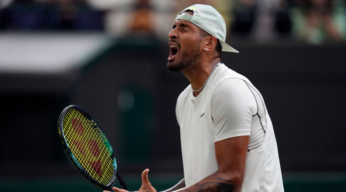 Australia's Nick Kyrgios reacts during his third round men's singles match against Greece's Stefanos Tsitsipas on day six of the Wimbledon tennis championships in London