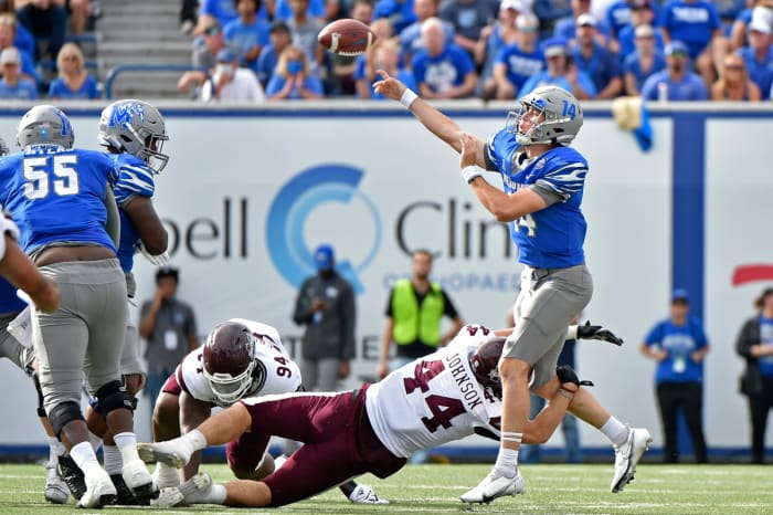 09/18/2021;  Memphis, Tennessee, USA;  Mississippi State Bulldogs linebacker Jett Johnson (44) pressures Memphis Tigers quarterback Seth Henigan (14) as he attempts a pass in the first half at Liberty Bowl Memorial Stadium.  Mandatory Credit: Justin Ford-USA TODAY Sports