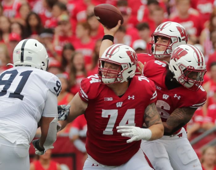 Wisconsin offensive lineman Michael Furtney (No. 74) blocks against Penn State (Credit: Mark Hoffman-USA TODAY Sports)