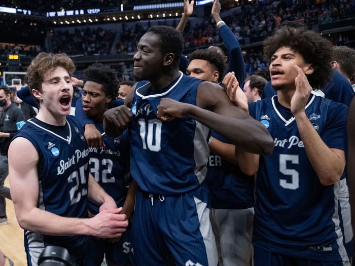 Saint Peter’s players celebrate their win over Kentucky
