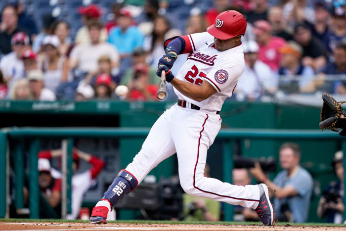 Juan Soto of the Washington Nationals hits a single in the first inning of a baseball game against the Pittsburgh Pirates at Nationals Park, Monday, June 27, 2022, in Washington.