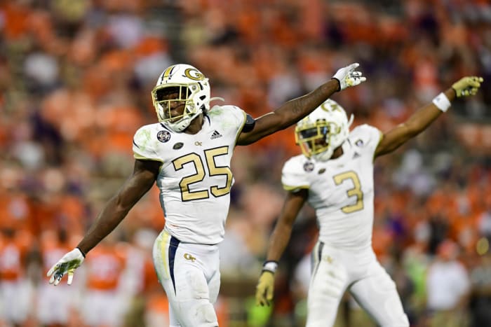 Georgia Tech Yellow Jackets linebacker Charlie Thomas (25) signals a turnover against the Clemson Tigers during the second half at Memorial Stadium.
