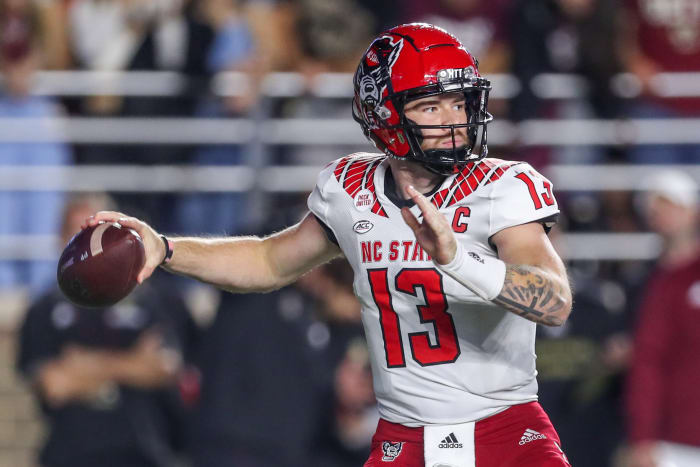 North Carolina State Wolfpack quarterback Devin Leary (13) passes the ball during the first half against the Boston College Eagles at Alumni Stadium.