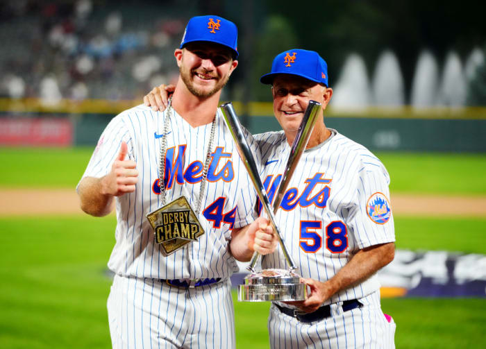 July 12, 2021;  Denver, CO, USA;  New York Mets first baseman Pete Alonso poses for a photo with bench coach Dave Jauss and the winners after winning the 2021 MLB Home Run Derby.