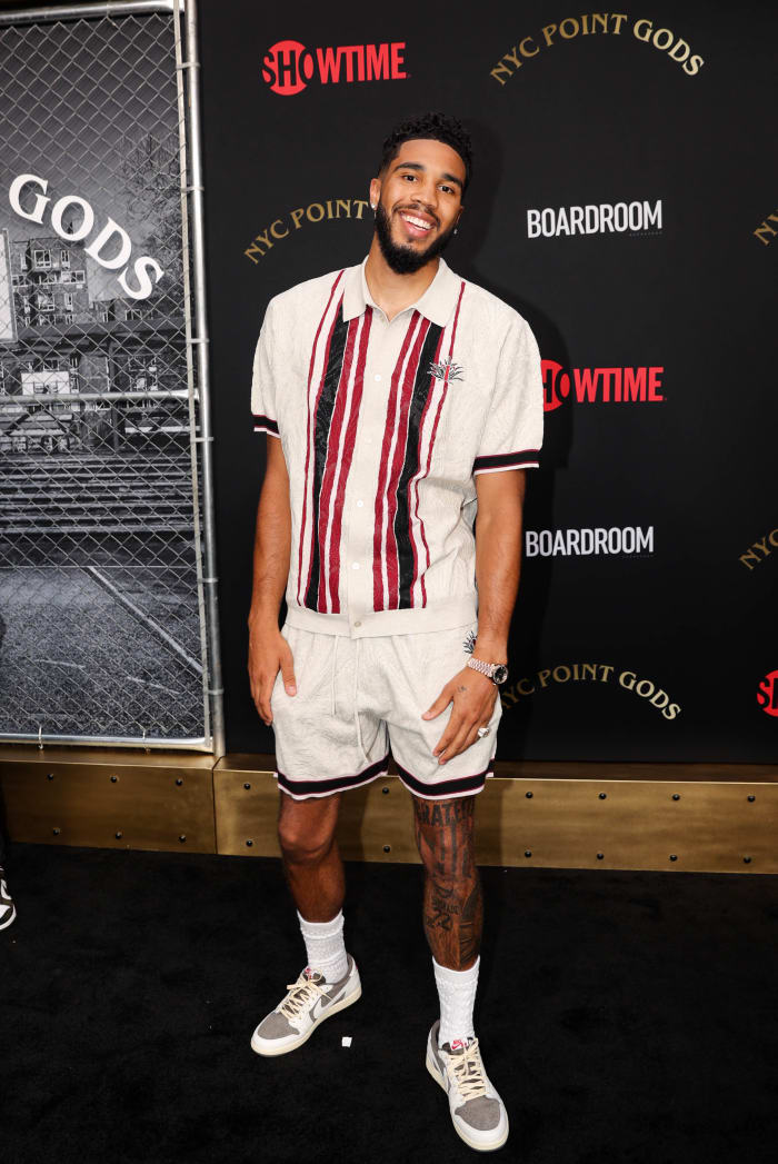 Jayson Tatum wears Travis Scott x Air Jordan 1 sneakers at the NYC Point Gods Premiere at The Midnight Theatre.