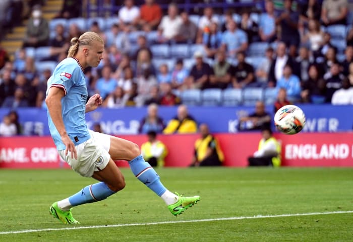 Erling Haaland pictured shooting during the 2022 Community Shield game between Manchester City and Liverpool