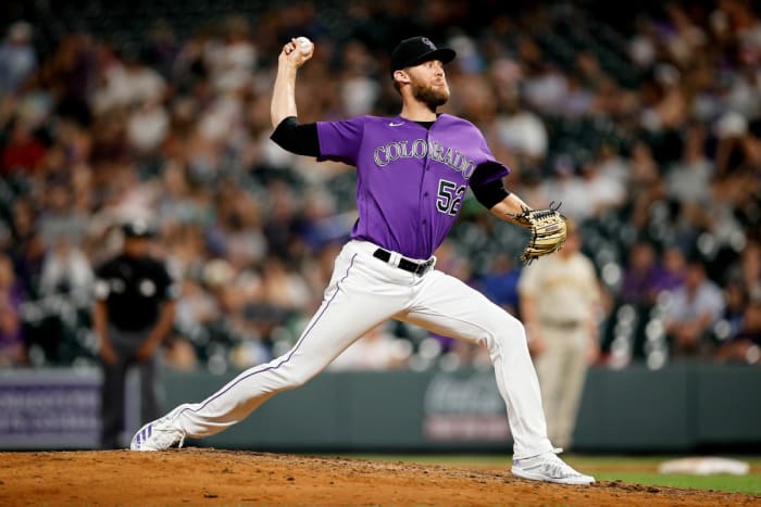 Jul 12, 2022; Denver, Colorado, USA; Colorado Rockies relief pitcher Daniel Bard (52) pitches in the ninth inning against the San Diego Padres at Coors Field.
