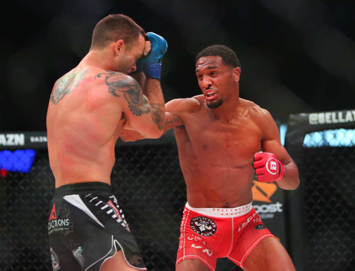 AJ McKee (red gloves) and Pat Curran (blue gloves) during Bellator 221 at Allstate Arena.