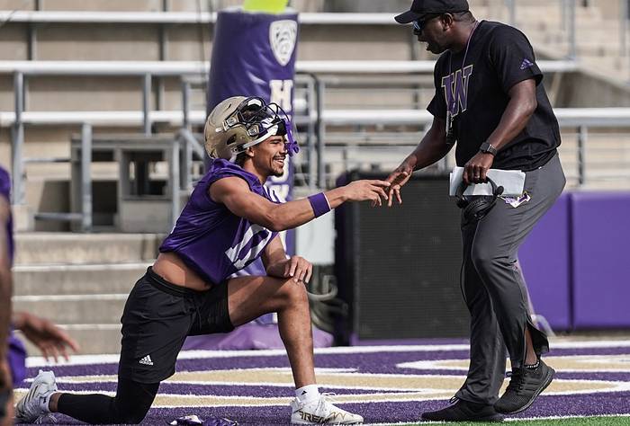 Jalen McMillan and JaMarcus Shephard share a moment.
