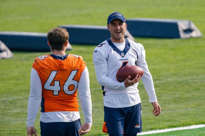 Denver Broncos punter Sam Martin (6) and long snapper Jacob Bobenmoyer (46) during training camp at the UCHealth Training Center.