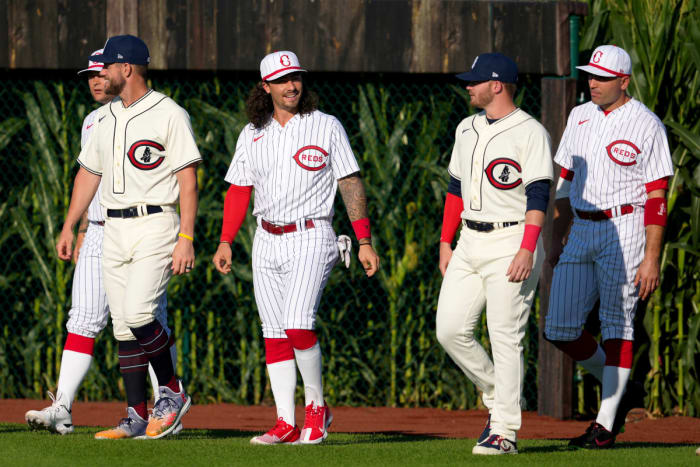 Cincinnati Reds second baseman Jonathan India (6) smiles toward Chicago Cubs left fielder Ian Happ (8) as they play on Thursday, August 11, 2022 at the MLB Field of Dreams Stadium in Dyersville, Iowa, the enter the right field from the corn fields.