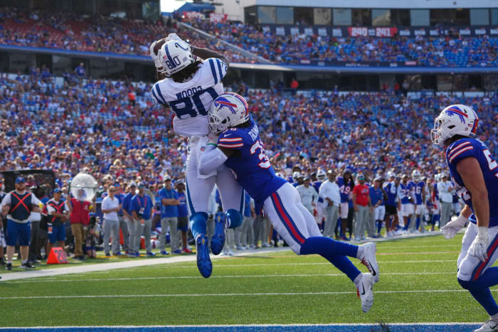 Indianapolis Colts tight end Jelani Woods (80) catches a pass for a touchdown with Buffalo Bills safety Josh Thomas (36) defending during the second half at Highmark Stadium.