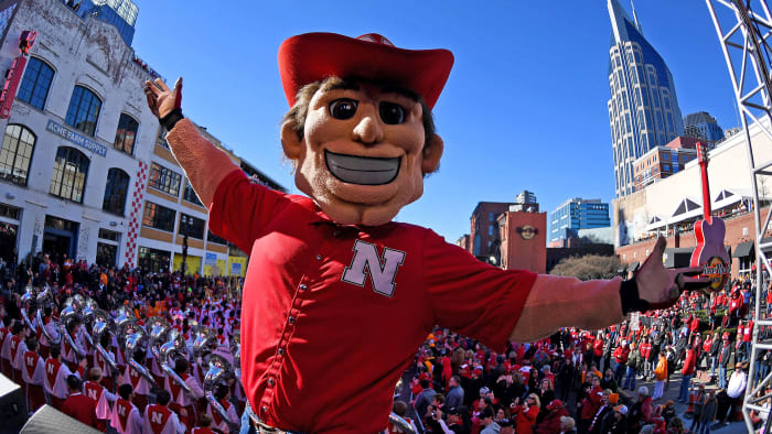 Nebraska Cornhusker mascot spreads his arms