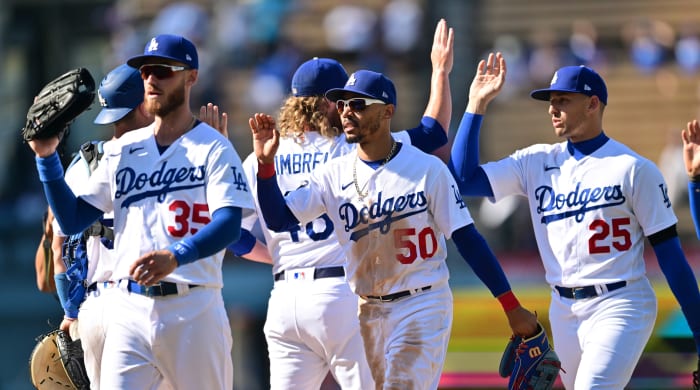 Trayce Thompson celebrates with other Dodgers.