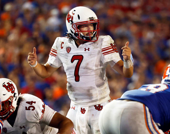 Utah Uts quarterback Cameron Rising, 7, will call a play against the Florida Gators in the second half at Steve Spurrier Florida Field.