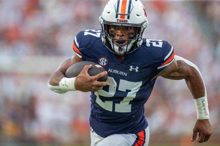 Giarquez Hunter (27) scores the first Auburn score by carrying the ball into the endzone from 19 yards out in a game between the Mercer Bears and the Auburn Tigers at Jordan Hare Stadium on September 3, 2022 Auburn Tigers.