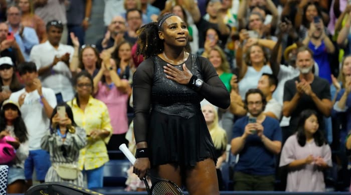 Serena Williams applauds the crowd after her US Open loss.
