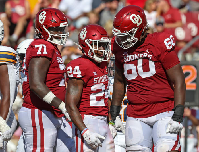 Tyler Guyton (60) started four games for the Sooners at offensive tackle this season, including OU's final two games of the year