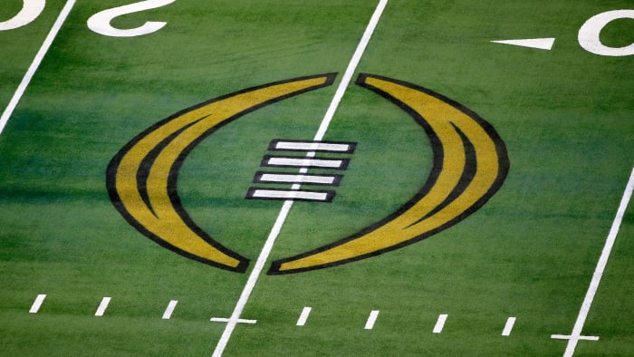 The College Football Playoff logo is painted on the field