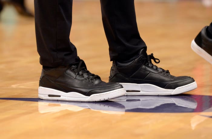Black and white shoes worn by Miami Heat head coach Erik Spoelstra.