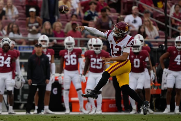 Sep 10, 2022; Stanford, California, USA; USC Trojans quarterback Caleb Williams (13) throws the ball on the run during the third quarter against the Stanford Cardinal at Stanford Stadium.