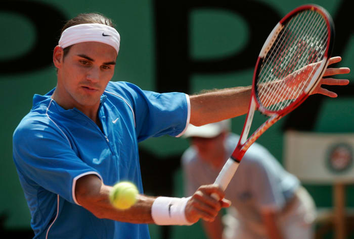 Roger Federer returns a shot at the 2004 French Open.