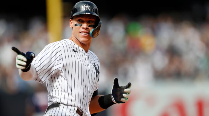 New York Yankees right-hander Aaron Judge (99) reacts while rounding the bases after a home hit against the Minnesota Twins during the sixth inning of a baseball game on Monday, September 5, 2022, in New York.