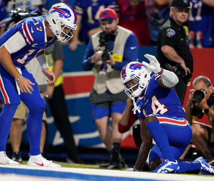 Buffalo Bills quarterback Josh Allen, 17, and wide receiver Stephon Diggs, 14, celebrate a touchdown during the third quarter at Highmark Stadium.