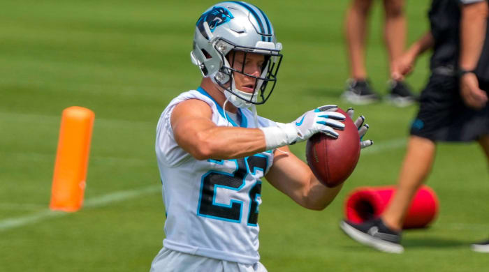 Panthers running back Christian McCaffrey catches a pass in practice during training camp.