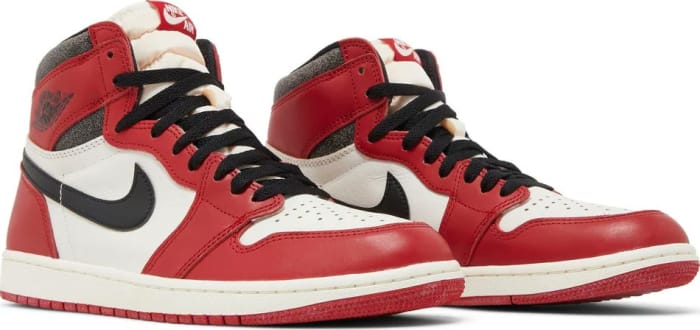 View of red, white, and black Air Jordan 1 shoes.