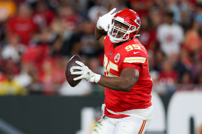 Oct 2, 2022; Tampa, Florida, USA; Kansas City Chiefs defensive tackle Chris Jones (95) reacts after recovering a fumble against the Tampa Bay Buccaneers in the second quarter at Raymond James Stadium. Mandatory Credit: Nathan Ray Seebeck-USA TODAY Sports