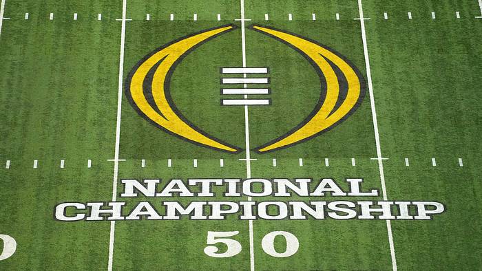 The national championship logo is on the field
