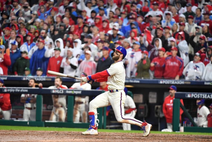Phillies star Bryce Harper finishes his swing
