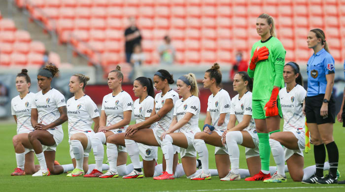 Courage players kneel during the Nation Anthem to protest the sexual manipulation that is going on within the NWSL.