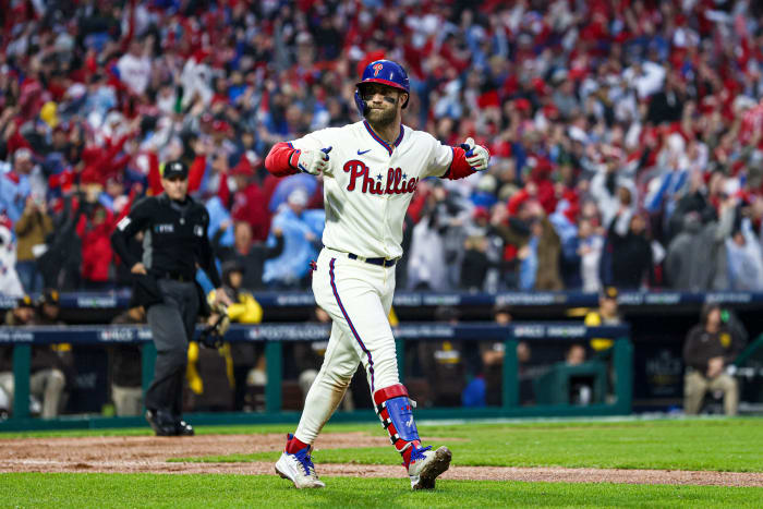 Bryce Harper reacts after hitting a two-run home run to clinch the NL pennant.
