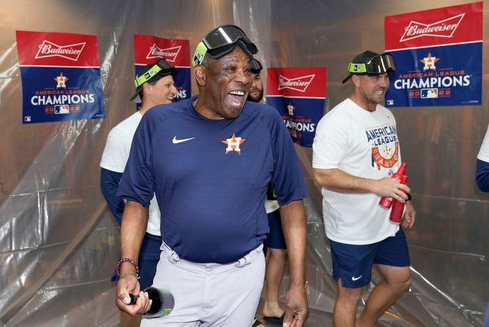 Astros manager Dusty Baker Jr. celebrates with his team after defeating the Yankees in Game 4 to win the American League Championship Series.