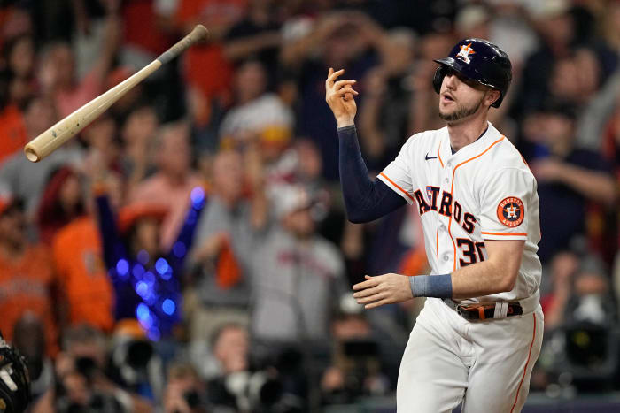 Astros' Kyle Tucker celebrates hitting his triple home run during the third inning of Game 1 of the World Series