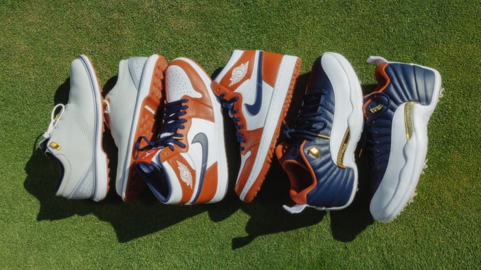Three pairs of Jordan golf cleats.