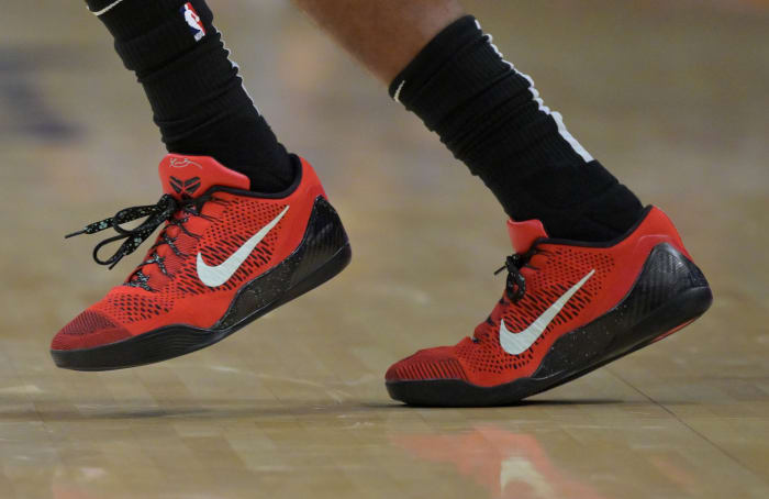 Red and black Nike Kobe shoes.