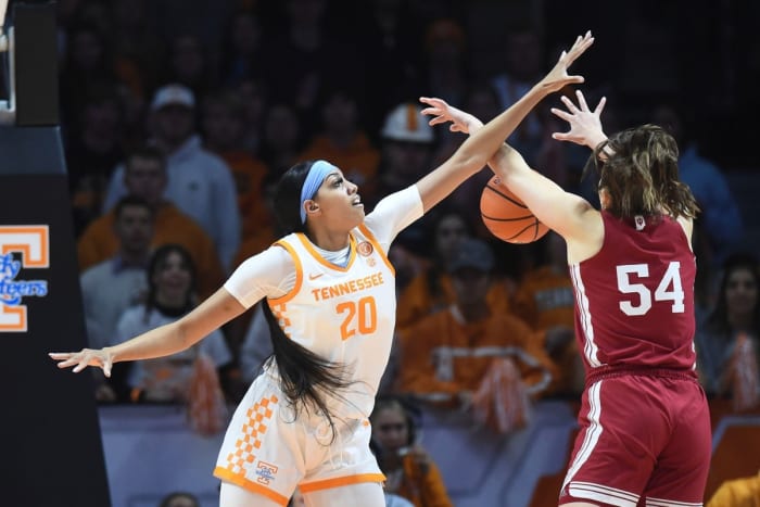 Tennessee center Tamari Key (20) blocks a shot attempt by Indiana forward Mackenzie Holmes (54) during the NCAA collegiate basketball game Monday November 14, 2022 in Knoxville, Tennessee.