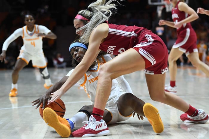 Tennessee forward Rickea Jackson (2) and Indiana guard Sydney Parrish (33) scramble for a loose ball during an NCAA collegiate basketball game Monday November 14, 2022 in Knoxville, Tennessee.