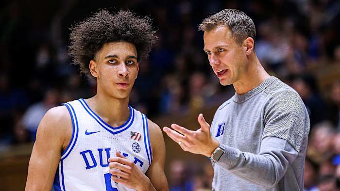 Duke’s Tyrese Proctor talks to coach Jon Scheyer